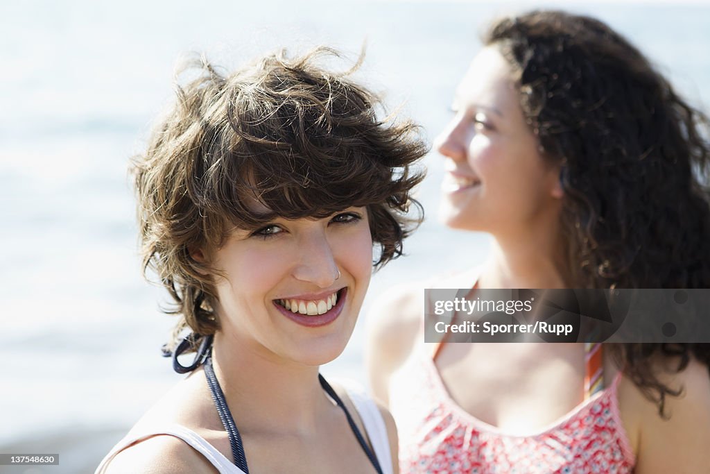 Women smiling together outdoors