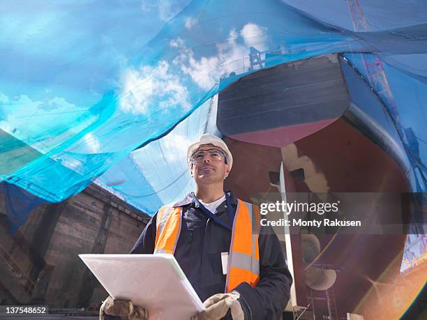 underside of ship in dry dock - shipyard stock pictures, royalty-free photos & images