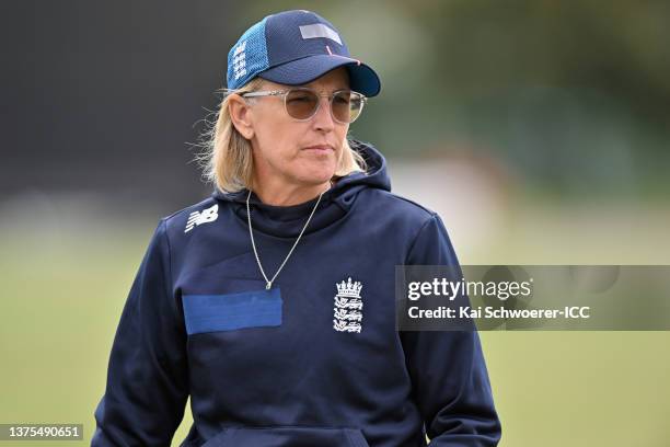 Head Coach Lisa Keightley of England looks on as rain delays play during the 2022 ICC Women's Cricket World Cup warm up match between South Africa...