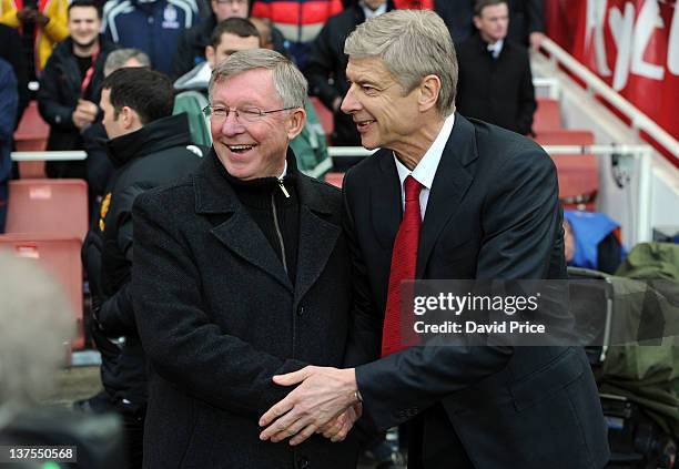 Arsene Wenger the Manager of Arsenal and Alex Ferguson the Manager of Manchester United shake hands before the Barclays Premier League match between...