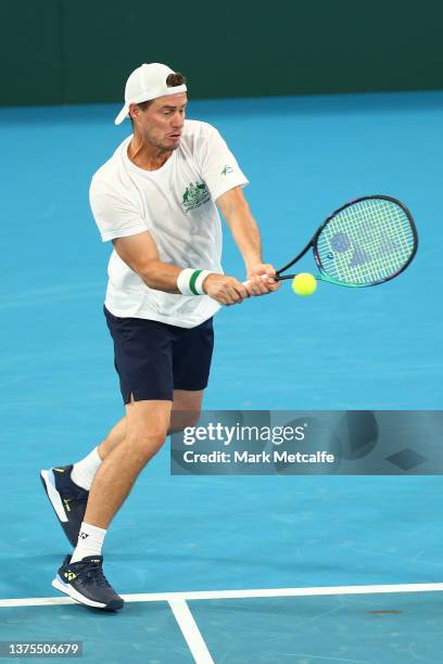 Australian Davis Cup captain Lleyton Hewitt plays a backhand during a practice session ahead of the 2022 Davis Cup Qualifier between Australia and...