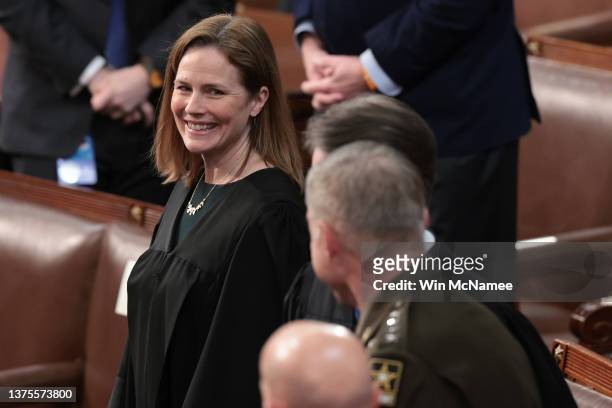 Supreme Court Associate Justice Amy Coney Barrett arrives in the House Chamber for U.S. President Joe Biden's State of the Union address at the U.S....