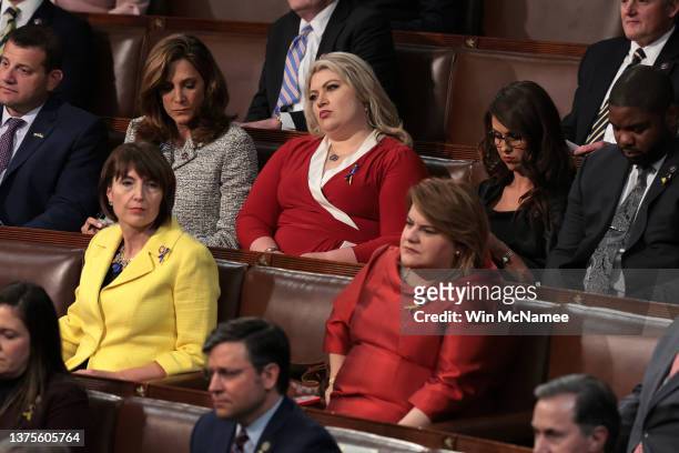 Republicans listen to U.S. President Joe Biden deliver the State of the Union address during a joint session of Congress in the U.S. Capitol's House...