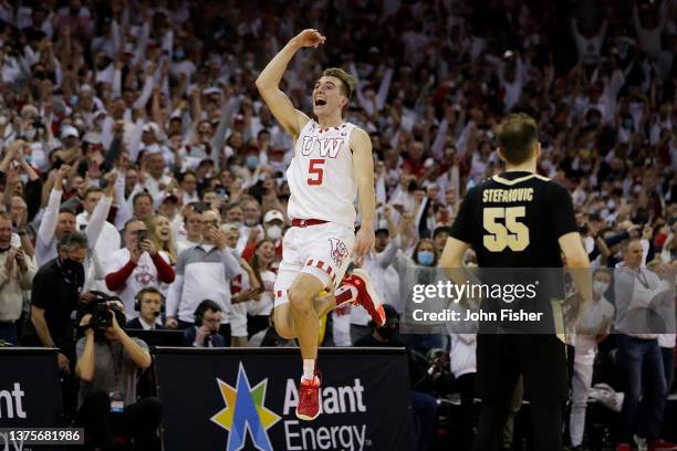 Tyler Wahl of the Wisconsin Badgers celebrates jumping into the air as the Wisconsin Badgers defeated the Purdue Boilermakers at the Big Ten at Kohl...