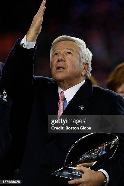 New England Patriots' owner Robert Kraft points to the heavens after mentioning his wife, Myra, after winning the game against Baltimore Ravens on...