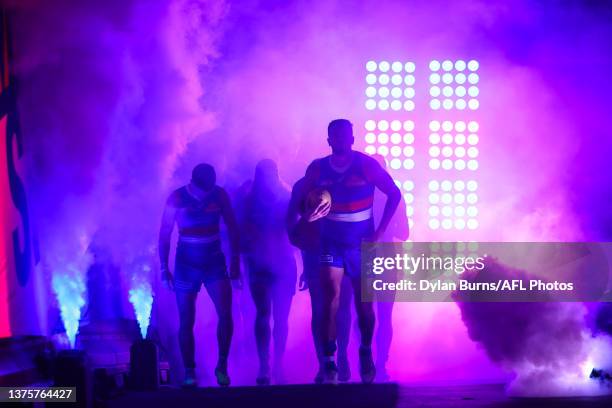 Marcus Bontempelli of the Bulldogs leads his team up the race during the 2023 AFL Round 16 match between the Western Bulldogs and the Fremantle...