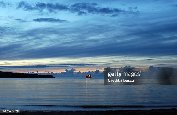 fishing ship at night in northern scotland (highlands) - peschereccio stock pictures, royalty-free photos & images