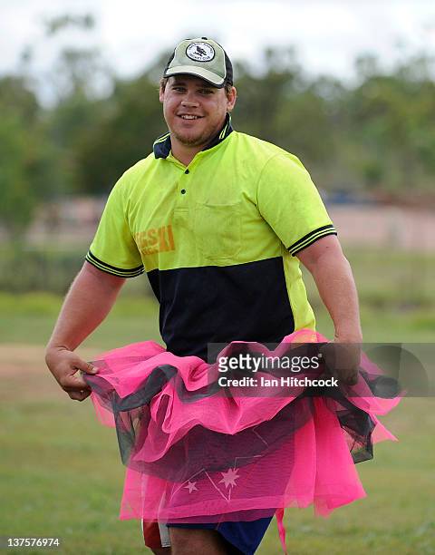 Paul Crow from the team 'Kegs On Legs XI' shows off his punishment skirt during the 2012 Goldfield Ashes cricket competition on January 22, 2012 in...