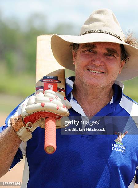 Chris Davy from the team 'Hidden Talent' smiles as he walks off the field after batting during the 2012 Goldfield Ashes cricket competition on...