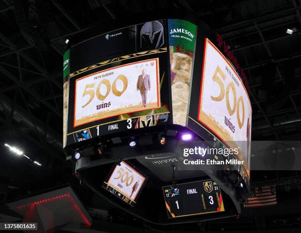 Tribute is displayed on the scoreboard for head coach Peter DeBoer of the Vegas Golden Knights for his 500th career win after the team's 3-1 victory...