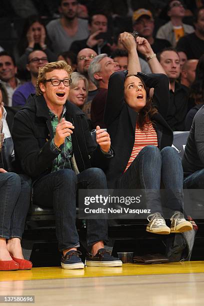 Simon Baker and Rebecca Rigg attend a game between the Indiana Pacers and the Los Angeles Lakers at Staples Center on January 22, 2012 in Los...