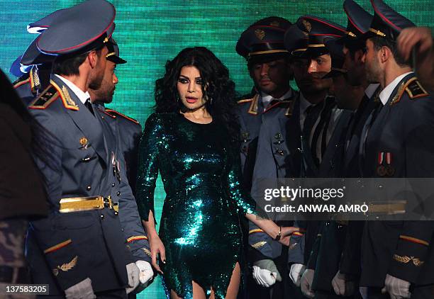 Lebanese singer Haifa Wehbe performs during the Mr Lebanon beauty contest in Adma, north of Beirut, late on January 22, 2012. AFP PHOTO/ANWAR AMRO