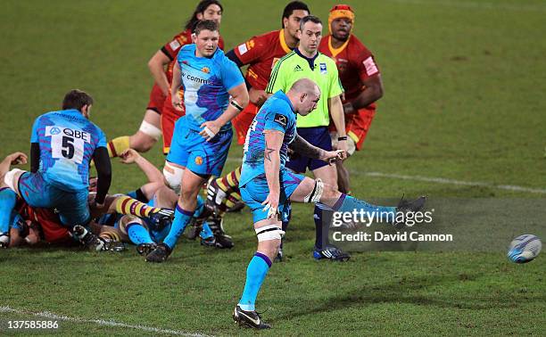 Brett Sturgess of Exeter Chiefs makes an unusual grubber kick during the Amlin Challenge Cup match between Exeter Chiefs and Perpignan at Sandy Park...