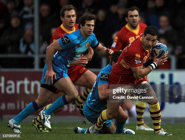 Farid Sid of Perpignan carrying the ball during the Amlin Challenge Cup match between Exeter Chiefs and Perpignan at Sandy Park on January 21, 2012...