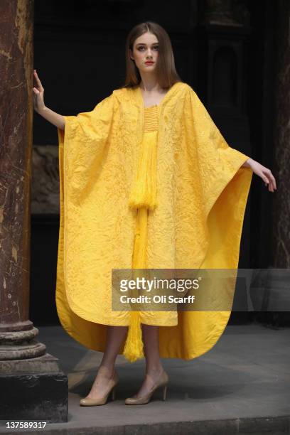 Model Bianca Gavrilas wears a a hand-embroidered cape made from the silk of the Golden Orb Spider in the V&A Museum's Medieval and Renaissance...
