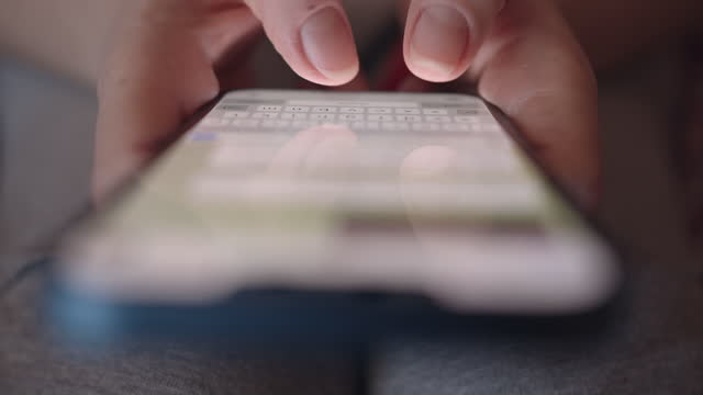 Hands Typing Text on Smartphone Close-up.Using Phone to Messenger on Internet,4k