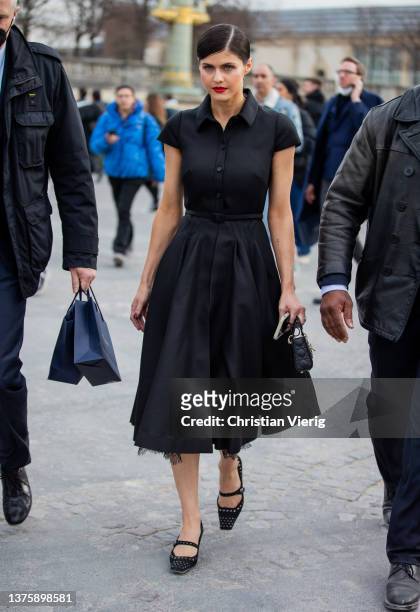 Actress Alexandra Daddario is seen wearing black skirt, blouse outside Dior during Paris Fashion Week - Womenswear F/W 2022-2023 on March 01, 2022 in...
