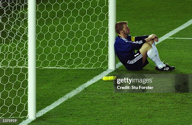 Dejected Oliver Kahn of Germany after the World Cup Final match against Brazil played at the International Stadium Yokohama, Yokohama, Japan on June...