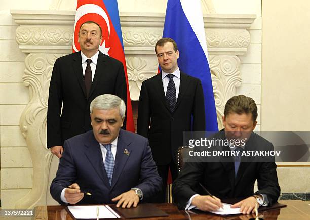 Russia's President Dmitry Medvedev , his Azerbaijan's counterpart Ilham Aliev look on while Russian Gazprom company chief executive Alexei Miller and...
