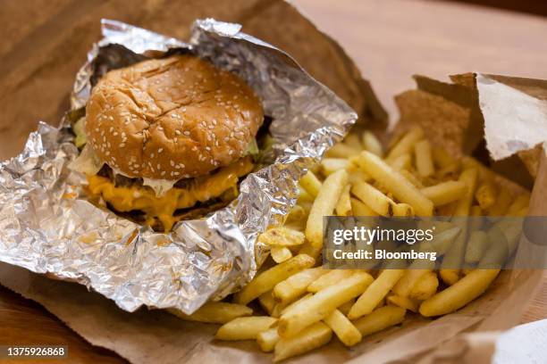 An order of a burger and french fries at the first outlet of US burger restaurant chain Five Guys in the Gangnam District of Seoul, South Korea, on...