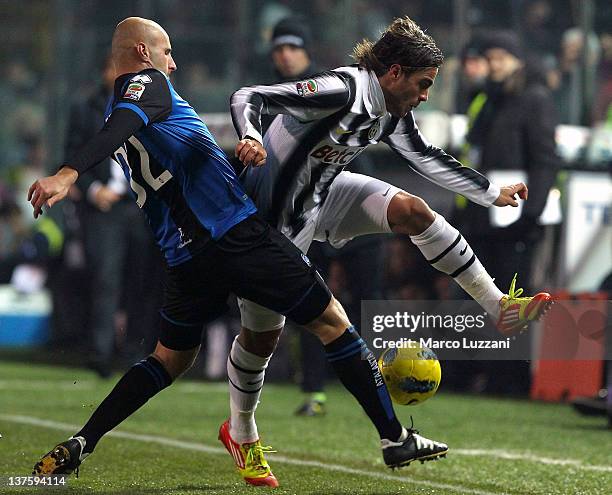 Alessandro Matri of Juventus FC competes for the ball with Michele Ferri of Atalanta BC during the Serie A match between Atalanta BC and Juventus FC...