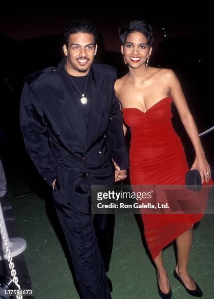 Actress Halle Berry and date, Christopher Williams attend the 24th Annual NAACP Image Awards on January 11, 1992 at Wiltern Theatre in Los Angeles,...