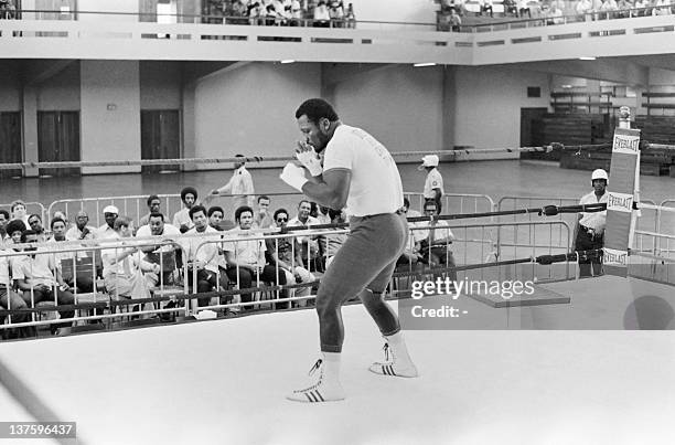 Picture taken in January 1973 of US heavyweight boxing champion Joe Frazier during a training in Kingston before his match against George Foreman.Joe...