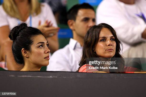 Actress Melanie Vallejo and Michala Banas watch the fourth round match between Lleyton Hewitt of Australiaand Novak Djokovic of Serbia during day...