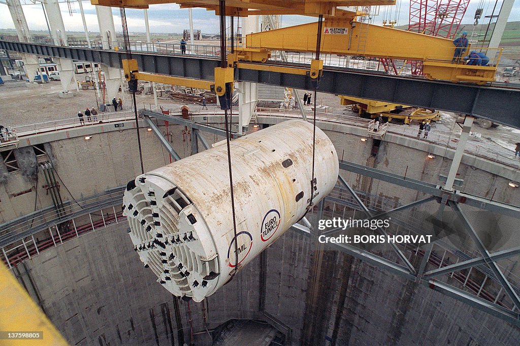Technicians check the setting of a part