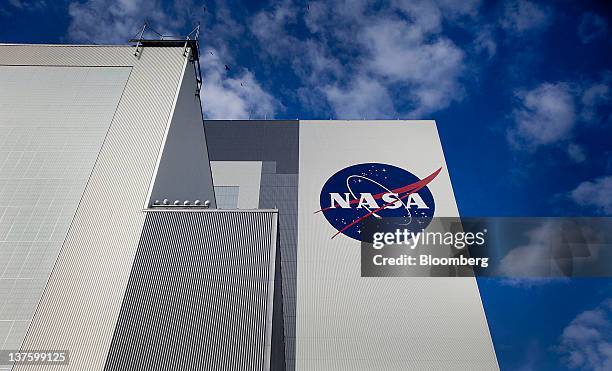 The NASA logo is seen on the outside of the Vehicle Assembly Building at the NASA Kennedy Space Center in Cape Canaveral, Florida, U.S., on Tuesday,...