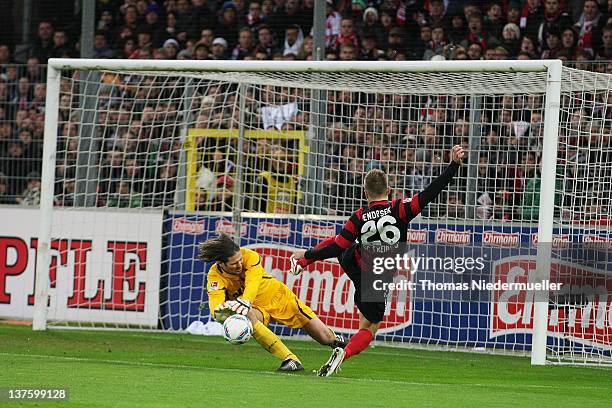 Erik Jendrisek of Freiburg shoots the ball to goalkeeper Simon Jentzsch of Augsburg during the Bundesliga match between SC Freiburg and FC Augsburg...