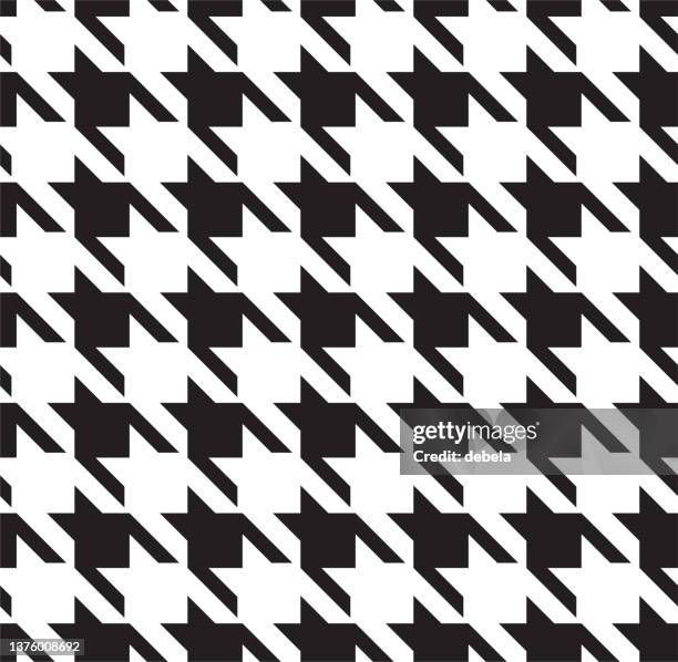 black and white houndstooth check pattern close-up. - houndstooth stock illustrations