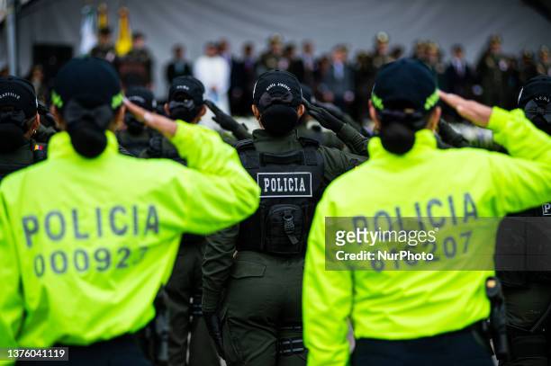 Women police officers pay respects during the taking command ceremony of Colombian Police Brigadrier General Sandra Patricia Hernandez, in Bogota,...