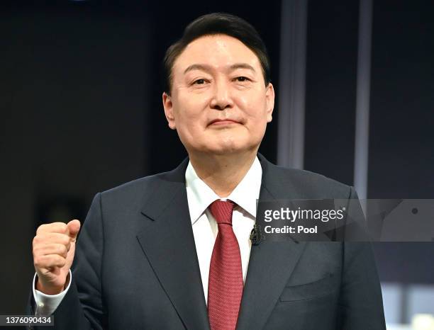 South Korea's presidential candidate, Yoon Suk-yeol of the main opposition People Power Party looks on before televised presidential debate for the...