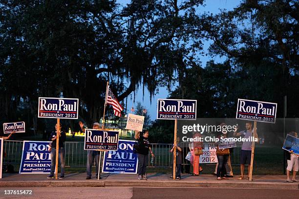 Supporters of Republican presidential candidate, U.S. Rep. Ron Paul set up along USF Holly Drive before the the GOP presidential debate sponsored by...