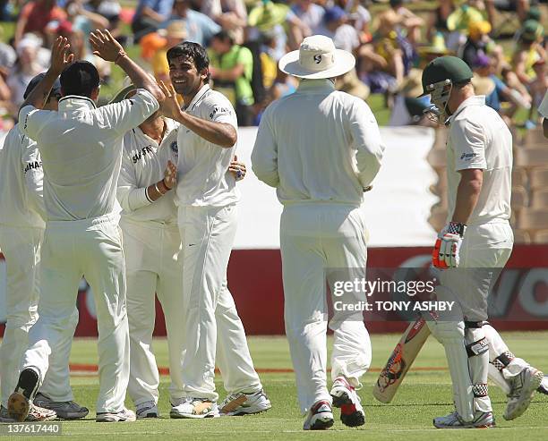 Indian fast bowler Zaheer Khan celebrates trapping Australian opening batsman David Warner LBW on day 1 of the fourth cricket Test match in the...