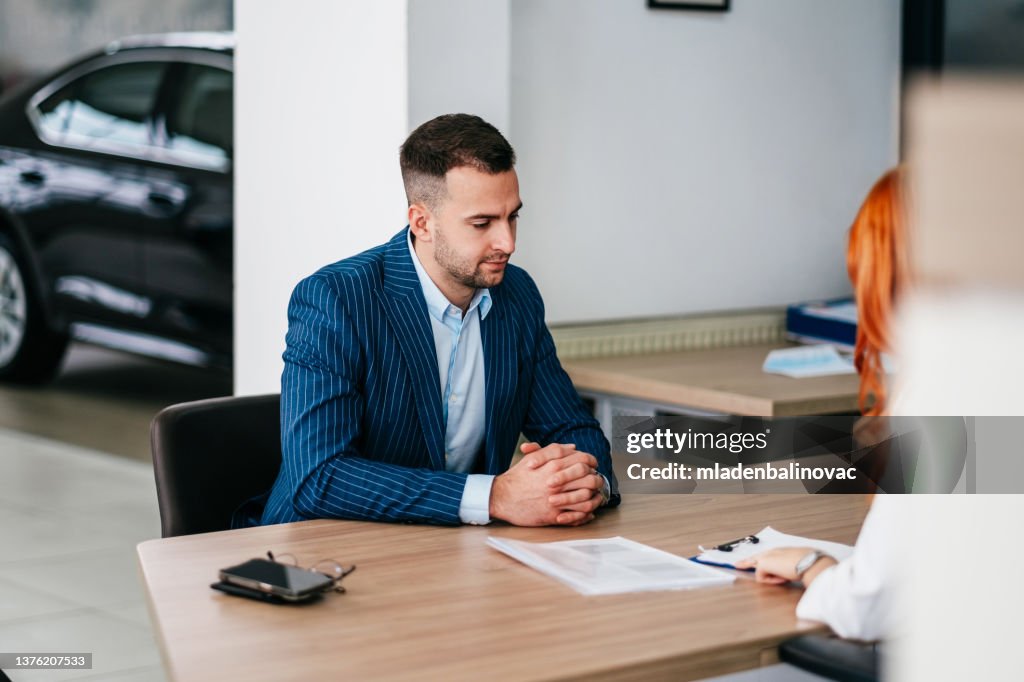 Successful deal in a car showroom!
