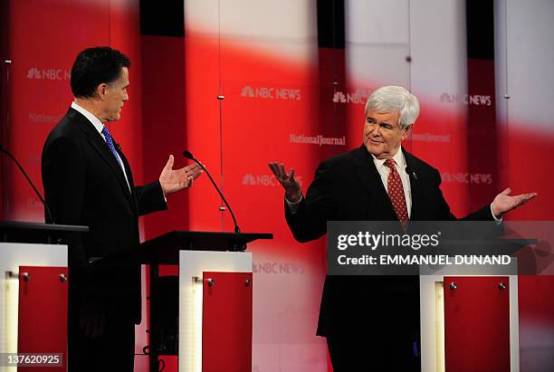 Republican presidential hopefuls Mitt Romney and Newt Gingrich take part in The Republican Presidential Debate at the University of South Florida in...