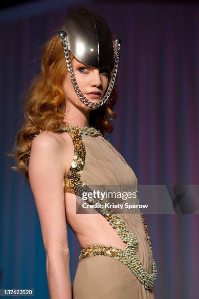 Model walks the runway during the Jantaminiau Haute-Couture 2012 show as part of Paris Fashion Week at Le Laboratoire on January 23, 2012 in Paris,...