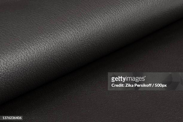 leather,full frame shot of black fabric,russia - leather stock pictures, royalty-free photos & images