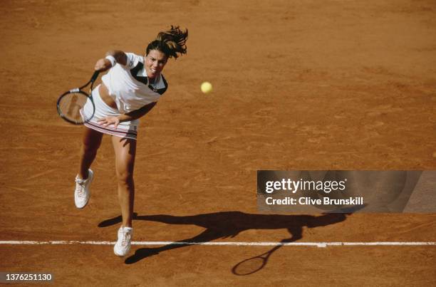 Jennifer Capriati from the United States serves against Tathiana Garbin of Italy during their Women's Singles Second Round match at the French Open...