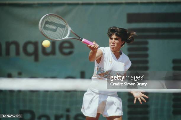 Jennifer Capriati from the United States plays a forehand return to Monica Seles of Yugoslavia during their Women's Singles Semi Final match at the...