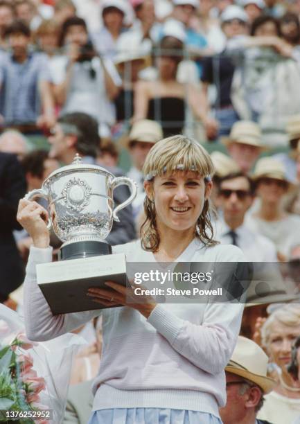 Chris Evert Lloyd from the United States holds the Coupe Suzanne Lenglen trophy after winning the Women's Singles Final match against Mima Jausovec...