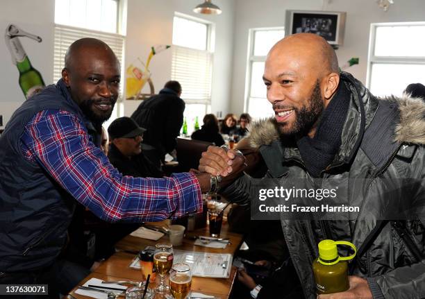 Sammi Rotibi and musician Common attend a filmmakers luncheon at the Stella Artois Cafe during the 2012 Sundance Film Festival on January 23, 2012 in...