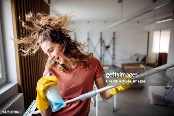 preparing apartment for the furniture - cleaner smiling stock pictures, royalty-free photos & images