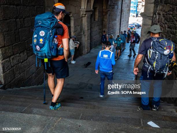 Pilgrims are seen arriving in the city which marks the end of the route. The Camino de Santiago is a large network of ancient pilgrim routes...