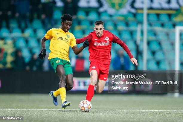 Roko Simic of FC Salzburg challenges Richmond Owusu of MSK Zilina during the UEFA Youth League Round Of Sixteen match between MSK Zilina and FC...