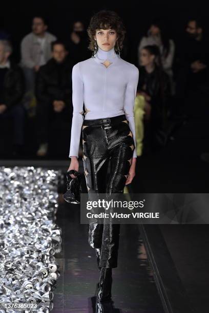 Model walks the runway during the Courreges Ready to Wear Fall/Winter 2022-2023 fashion show as part of the Paris Fashion Week on March 1, 2022 in...