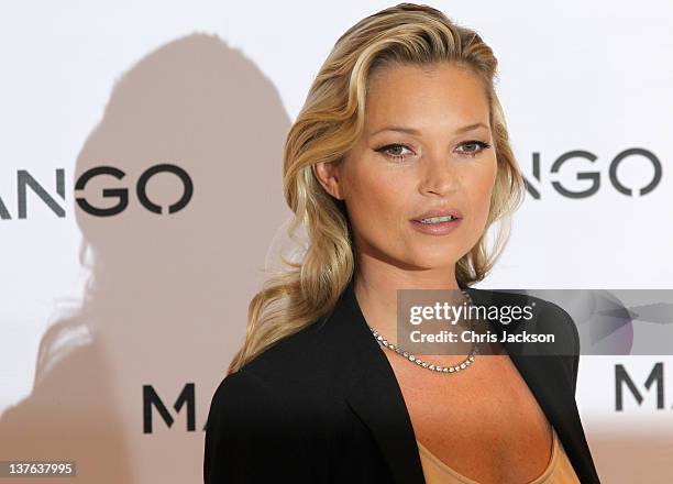 Model Kate Moss poses for photographs at the Mango Store Oxford Street on January 24, 2012 in London, England. Kate Moss was today launched as the...