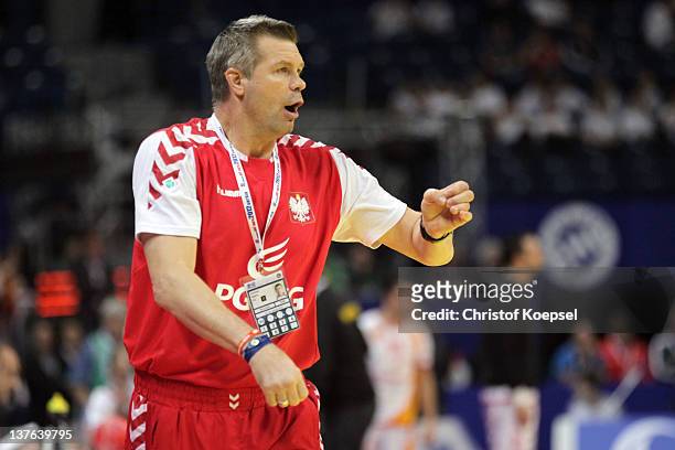 Head coach Bogdan Wenta pol issues instructions during the Men's European Handball Championship second round group one match between Poland and...